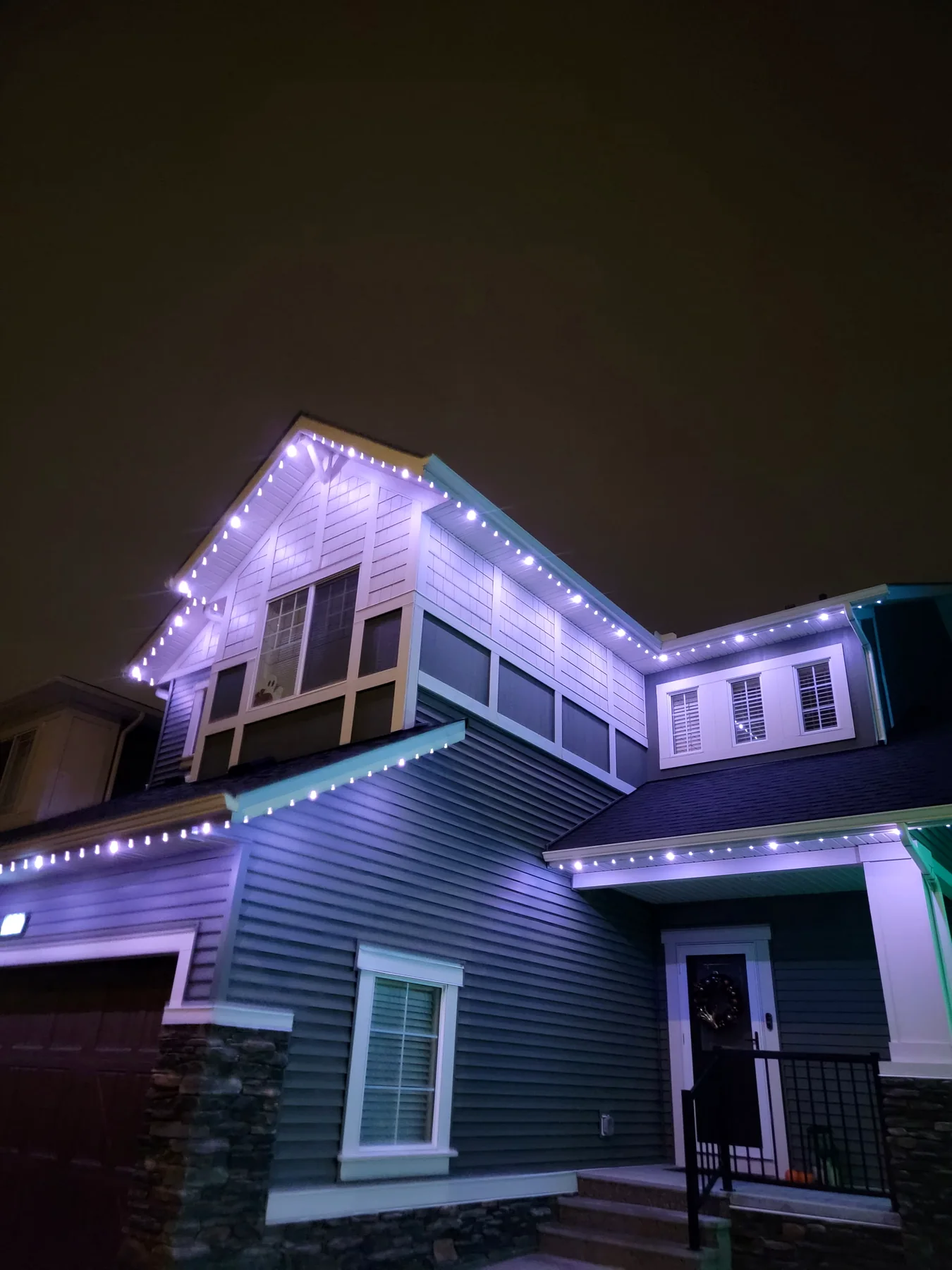 Completed permanent lighting illuminating a Calgary Area home