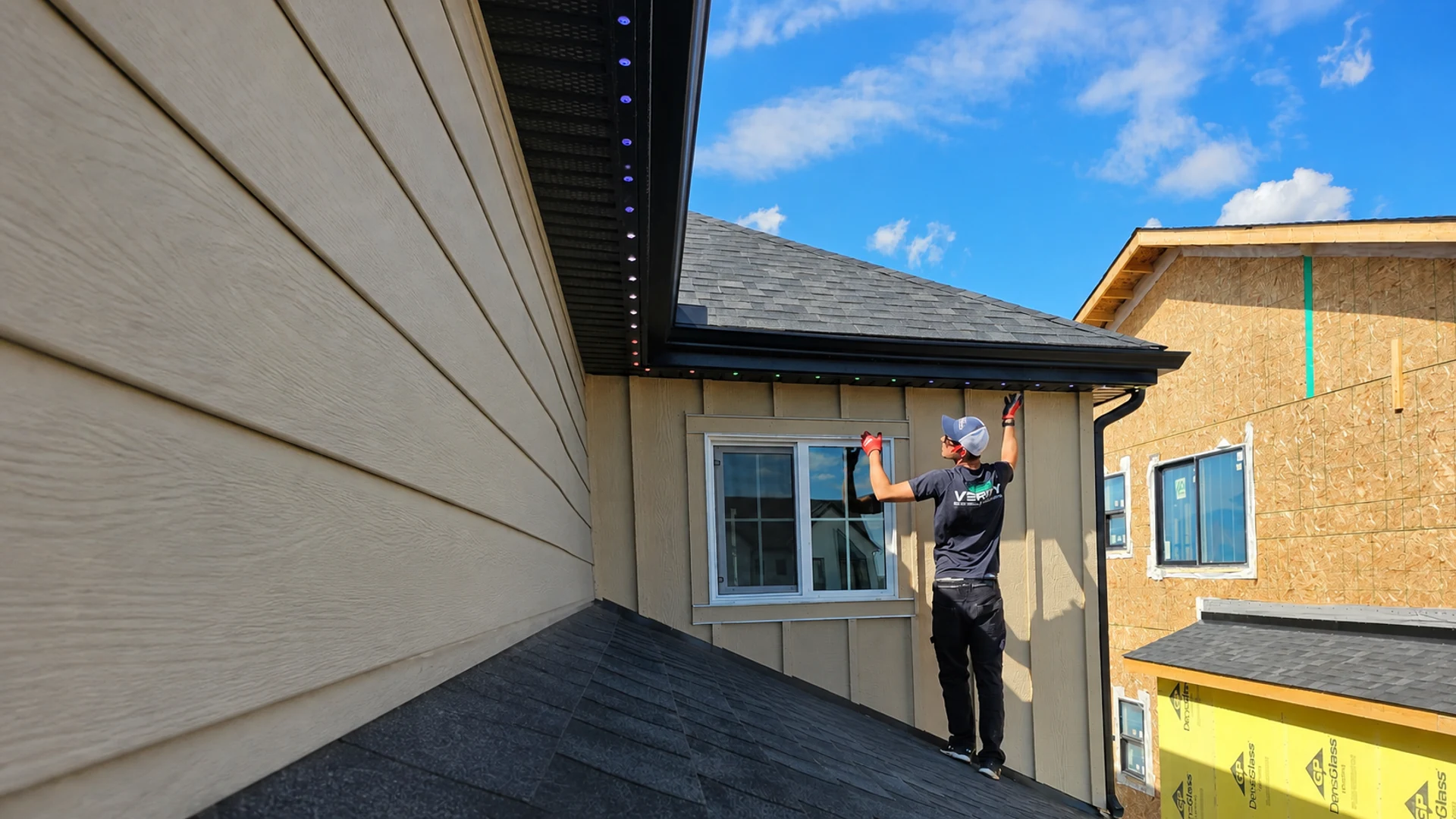 Verity electrician installing permanent Celebright lighting on a Calgary Area home
